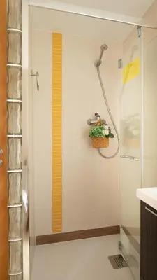 a bathroom with a shower with a plant in it at Tú & Yo Moncofa in Moncófar