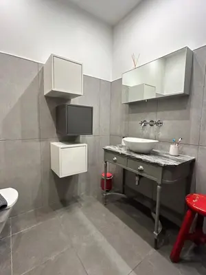 a bathroom with a sink and a toilet in it at Apartamento chic en Ciutat Vella in Valencia