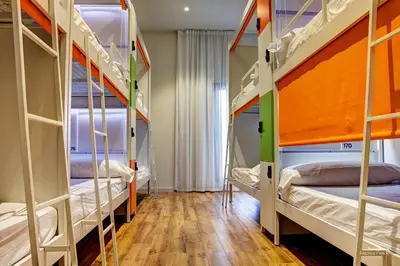 a room with bunk beds in a hostel at Urban Youth Hostel in Valencia