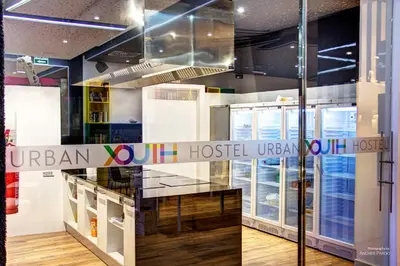 a store with a sign that reads durham our host urban at Urban Youth Hostel in Valencia