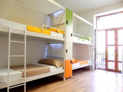 a room with two bunk beds in a hostel at Urban Youth Hostel in Valencia