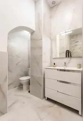 a white bathroom with a sink and a toilet at Apartamento Exclusivo en Valencia in Valencia
