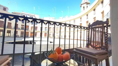 a bowl of fruit sitting on a balcony at Reina in Valencia