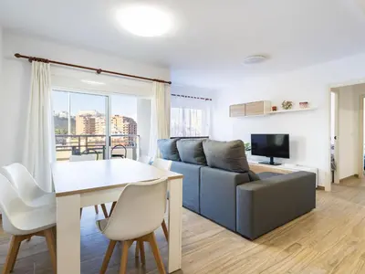 a living room with a couch and a table at Apartment Orion-2 by Interhome in Cullera