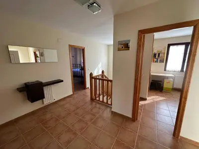 a living room with a staircase and aoyer with aoyer at Oasis en Riba Roja del Turia in Riba-Roja De Turia