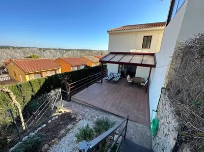 an aerial view of a house with a patio at Oasis en Riba Roja del Turia in Riba-Roja De Turia