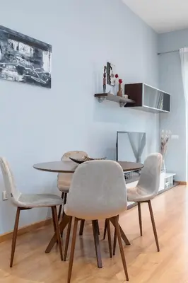 a dining room with a table and chairs at Patacona Mediterranean Beach in Valencia