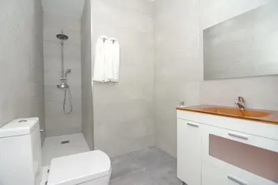 two beds in a room with white walls at Bam ! Centro ! Centre ! Zentrum ! in Valencia