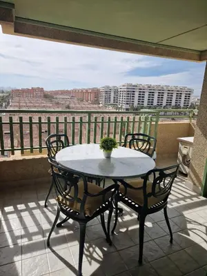 a table and chairs on a balcony with a view at Playa Patacona con vistas al mar in Valencia
