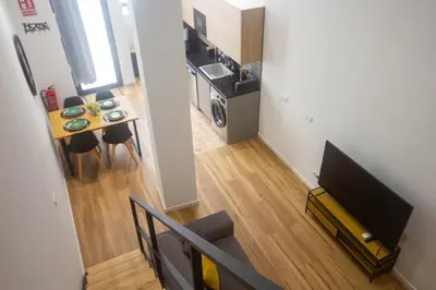 a small apartment with a kitchen and a living room at Beach Apartments Valencia 2 in Valencia