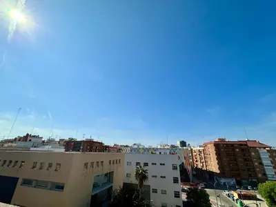 a view of a city with a building and buildings at Your Long Stay Attic Home in Valencia in Valencia