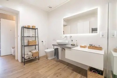 a white bathroom with a sink and a mirror at Calm House, a 10 min playa de la de Cullera in Llaurí
