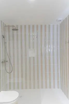 a bathroom with a shower with a toilet in it at Malvarrosa Beach Stay! in Valencia