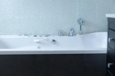 a white sink in a bathroom with a mirror at Villa en Valencia, piscina privada y metro 500m in La Eliana