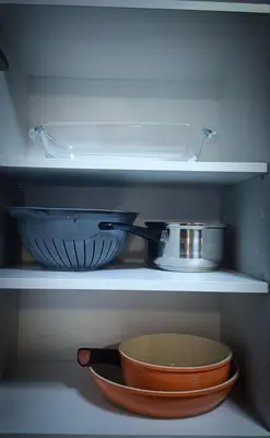 a whisk and a bowl on a shelf in a refrigerator at PLAYA SUITES a 50 metros de la playa in Puerto de Sagunto