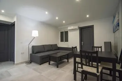 a living room with a couch and a table at Despuig Delight in Valencia