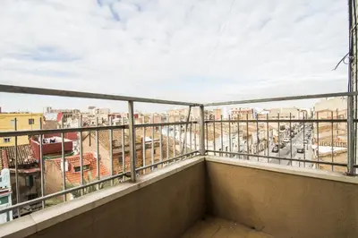 a balcony with a view of a city at Relaxing Reina in Valencia
