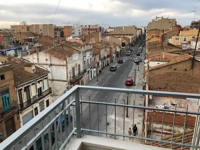 a view of a city street from a balcony at Relaxing Reina in Valencia