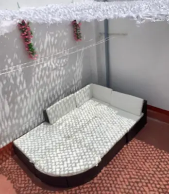 a small bed in a corner of a room at Plaça de l'Almudí, where else! in Onda