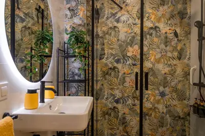 a bathroom with a sink and a shower at Artistic flat next to Ruzafa Welcome to the Jungle in Valencia