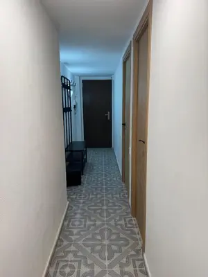 an empty hallway with a hallwayngth at Apartamento en Cullera in Cullera