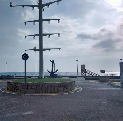 a large pole with skateboards on it in a parking lot at Modern Apartment Frontline Beach in Mareny Blau