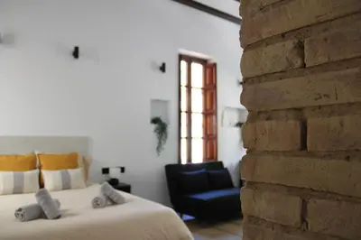 a bathroom with a sink and a toilet and a shower at Las Arenas Suites 1 PLAYA in Valencia
