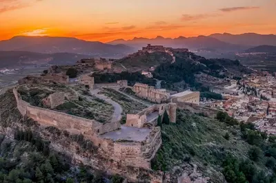 an aerial view of the walled city ofhens at sunset at Bonita Planta baja con patio en 1ª línea de playa in Puerto de Sagunto