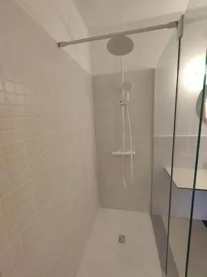 a shower with a glass door in a bathroom at CariSan2 - fully equipped, 6 min to beach in Valencia