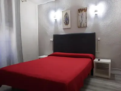 a bathroom with a sink and a shower at Pensión Jamaica in Valencia
