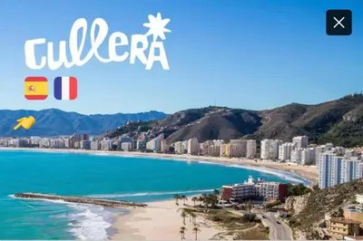a picture of a beach with buildings and the ocean at Vistas espectaculares 