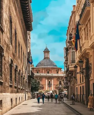 a building with a dome in the middle of a street at Calm Jungle Apartment Near Valencia in Aldaia