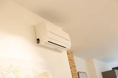 a room with a wall mounted air conditioner on the wall at Luxury Apartment City Center in Valencia