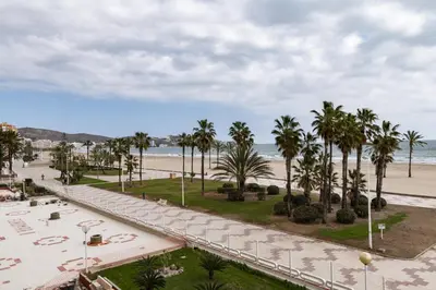 a view of the beach from the balcony of a resort at EUROMAR, Esc-6, 15-45 in Cullera