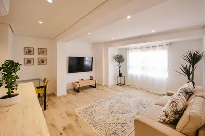 a living room with a couch and a table at Carmen flat in Valencia