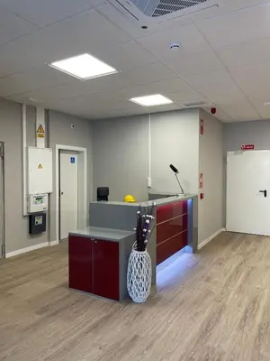 an office with a desk and a vase of flowers at Unicorn Residence for students New Opening 2024 in Valencia