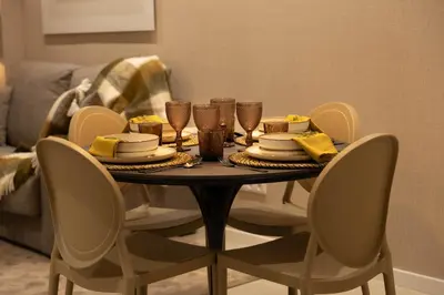 a dining room table with food and drinks on it at Dorm4You Centro in Valencia