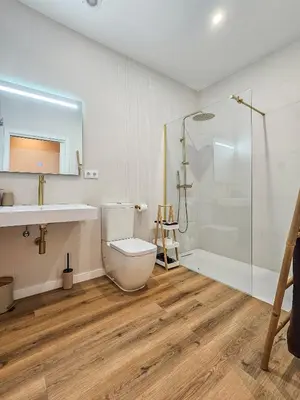 a bathroom with a toilet and a shower at Pivote Flats - Marina A in Valencia