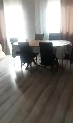 a dining room table and chairs in a room at Juan in Carlet