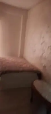 a small room with a bed and a table at Juan in Carlet