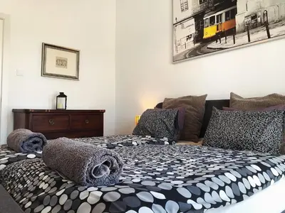 a bedroom with a bed with pillows on it at Casa the Dutchman in Navarrés