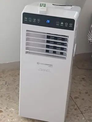 a white oven sitting on top of a floor at Casa del Cerro in Eslida