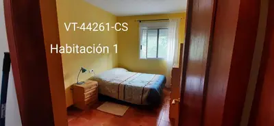 a small bedroom with a bed in a room at Casa del Cerro in Eslida