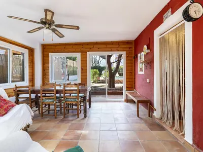 a dining room with a table and chairs at Holiday Home D'estiu by Interhome in El Grao