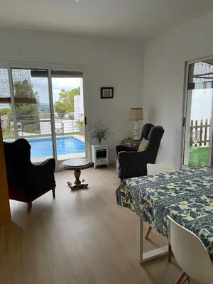 a bathroom with a sink and a tub and a toilet at 3 Bed Chalet-Pool-Pets-Hot Tub-Parking-Garden in Chiva