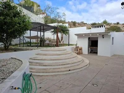 a group of concrete stairs in a courtyard at 3 Bed Chalet-Pool-Pets-Hot Tub-Parking-Garden in Chiva