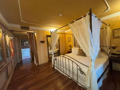 a bedroom with a bed with a canopy at Masía De Lacy in Museros