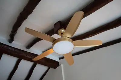 a ceiling fan on top of a room at Hotel Boutique - Estancia dos Olivos in Quesa