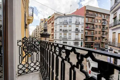 a view from a balcony of a city with buildings at Espectacular y luminoso apartamento en el centro in Valencia