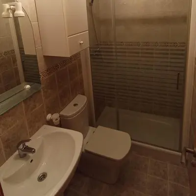 a bathroom with a toilet and a sink and a shower at Apartamento 2 habitaciones playa de Canet de Berenguer in Canet de Berenguer